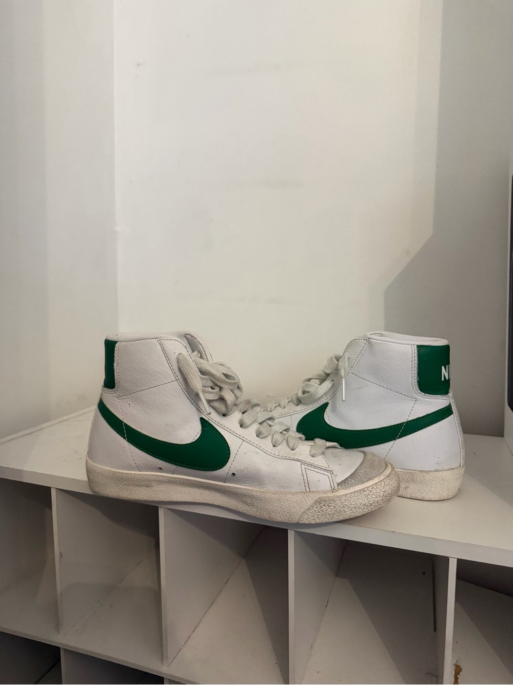 Nike White High-Top Sneakers with Green Swoosh